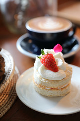 Strawberry cake dessert on wood table