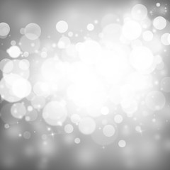 Grey sparkle rays lights with bokeh elegant abstract background. Dust sparks background.