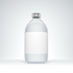 Big transparent glass bottle with metal cap and label filled by still water on the white background.