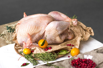 Fresh raw turkey in a roasting pan ready for the oven.