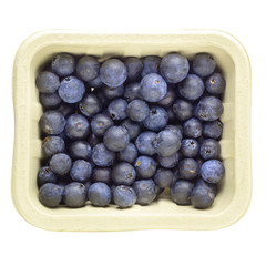 Fresh ripe blueberry in paper box isolated over a white background