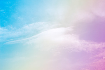 Obraz na płótnie Canvas A soft fog cloud background with a pastel colored orange to blue gradient