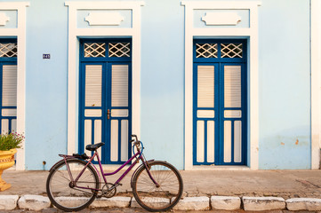 bicycle in front of old house