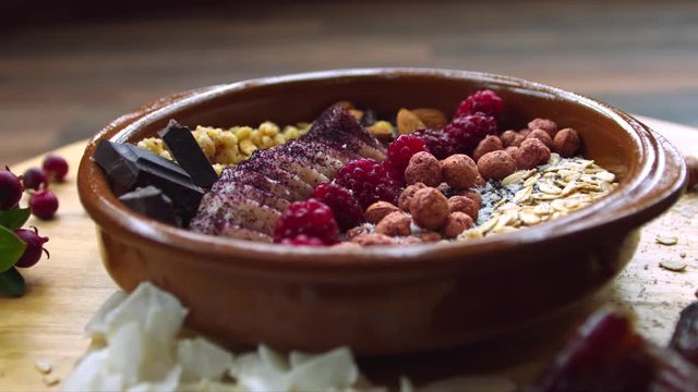 turntable shot of delicious vegan breakfast presented in a large clay bowl