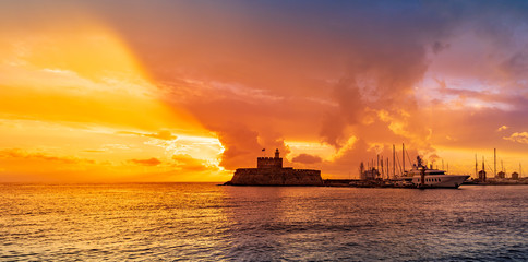 Obraz premium Agios Nikolaos fortress on the Mandraki harbour of Rhodes Greece