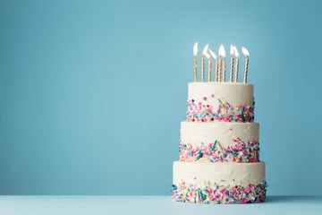 Fotobehang Tiered birthday cake with sprinkles © Ruth Black