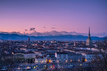 Turin panorama at dusk with the backdrop of the Italian Alps