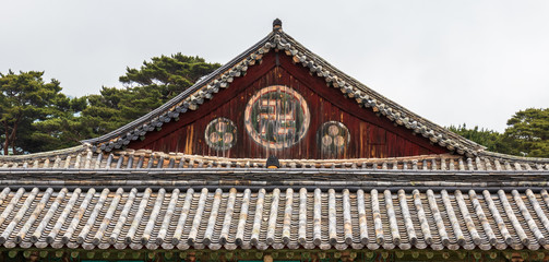 Detail view on roof of korean buddhistic Bulguksa Temple on a clear day. Located in Gyeongju, South Korea, Asia.