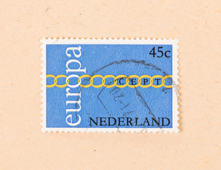 THE NETHERLANDS 1980: A stamp printed in the Netherlands shows holland as part of Europe, circa 1980