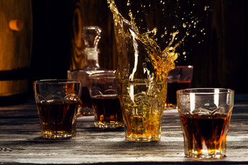 brandy splash of alcohol in a glass