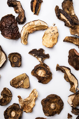 Dried mushrooms, appetizing culinary background. Ingredients of dishes.