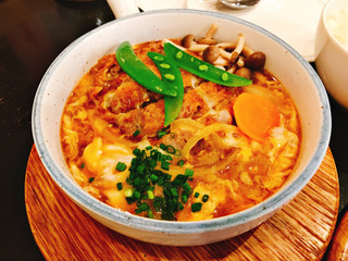 Katsudon or Rice topped with deep fried pork cutlet in Thailand. 