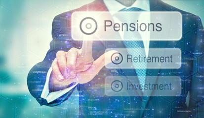 A business man selection a Pensions button on a futuristic display with a concept written on it.