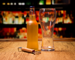 Beer glass with bottle and opener