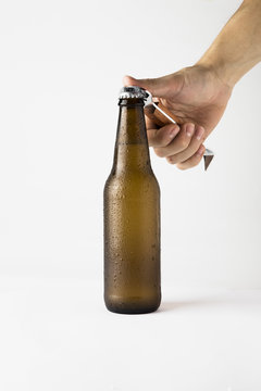 Hand Opening Beer Bottle