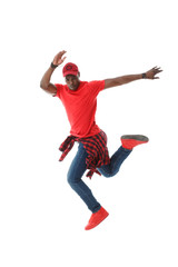 Young black stylish guy in red in a jump isolated on white background.