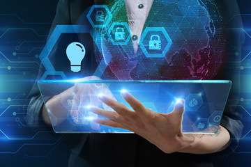 The concept of business, technology, the Internet and the network. A young entrepreneur working on...