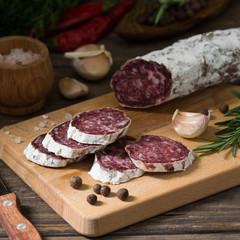 Sausage on a wooden Board in a rustic style