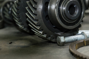 Gears, impaled on the shaft spline. Replacement spare part of the machine tool.