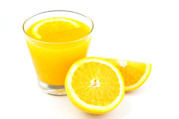 Yellow flesh navel orange fruits and juice in glass isolated on white background