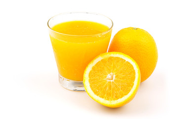 Yellow flesh navel orange fruits and juice in glass isolated on white background