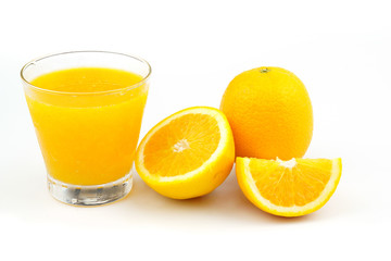 Yellow flesh navel orange fruits and juice in glass isolated on white background