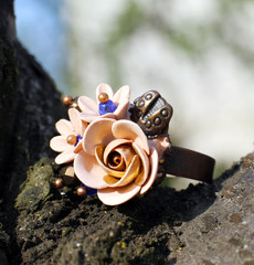 the Hand made ring in a shape of flowers from polymer clay
