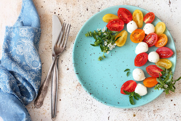 Mozzarella, cherry tomatoes and basil.Caprese salad 