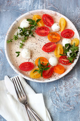 Mozzarella, cherry tomatoes and basil.Caprese salad 