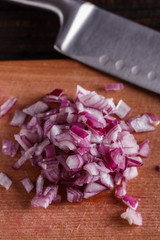 red onion cut on a wooden board