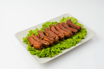 grilled steak with salad on white plate