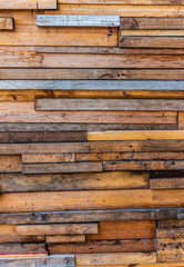 Abstract and vintage wooden wall style made of the lumber or waste wood as textured and background