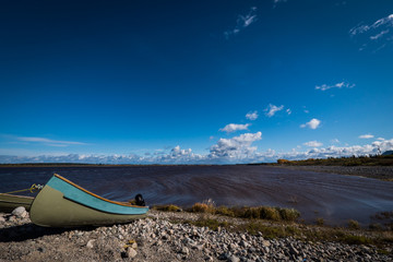 Cree Freighter Canoe on the shore of James Bay at Eastmain, Quebec, summer