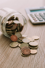 savings concepts with pot and coins