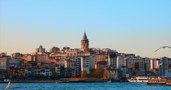 Galata Tower in istanbul City of Turkey.  View of the Istanbul City of Turkey with bosphorus, seagulls and boats.