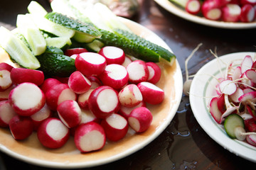 Set of vegetables for salad: cucumbers and radish.