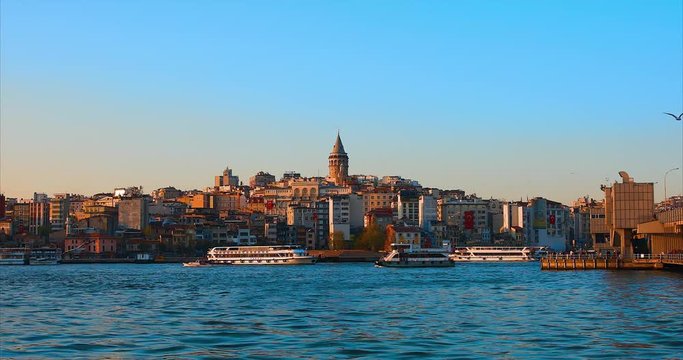 Galata Tower in istanbul City of Turkey.  View of the Istanbul City of Turkey with bosphorus, seagulls and boats.