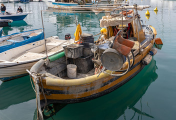 LERICI, LIGURIA/ITALY  - APRIL 21 : Boats in the harbour in Lerici in Liguria Italy on April 21, 2019. Two unidentified people