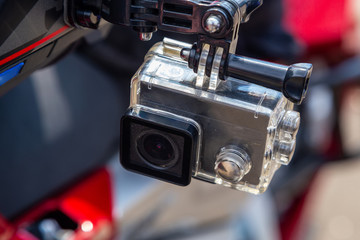 Fototapeta na wymiar Action camera on a motorcycle rider's helmet
