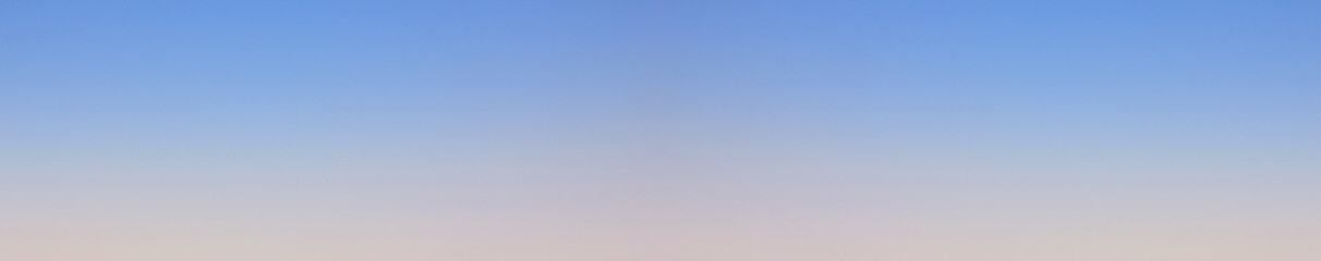 Gradient sky background of blue and gray stormy texture. Moody backdrop of blank natural sky banner 