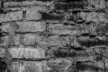 Texture, brick, wall, it can be used as a background . Brick texture with scratches and cracks