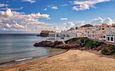 Mediterranean beach and town in Cabo de Gata natural Park, Spain.