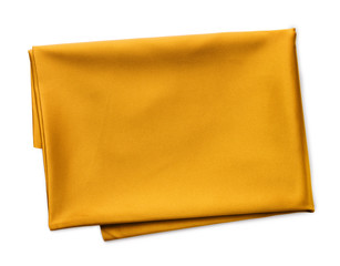 folded piece of yellow satin fabric isolated on white background
