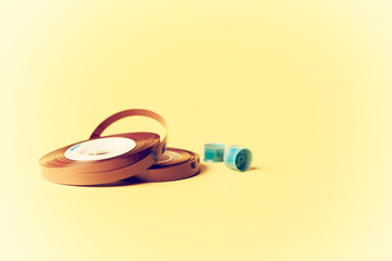 music tape over yellow background