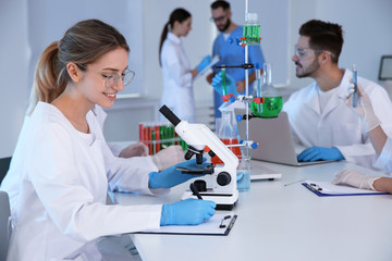 Medical students working in modern scientific laboratory