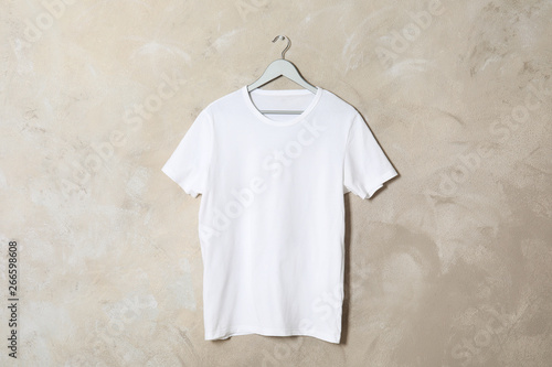 Download Hanger With White T Shirt On Color Background Mockup For Design Wall Mural New Africa