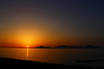 Amazing summer sunset taken on the beach on the greek island Kos.