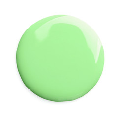 Spilled nail polish on white background, top view