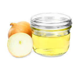 Glass jar of onion syrup and fresh ingredient on white background