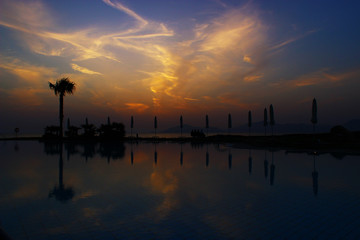 Amazing summer sunset taken at a pool on the greek island Kos.
